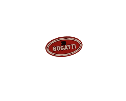 a red and white sticker with the word bugatti on it