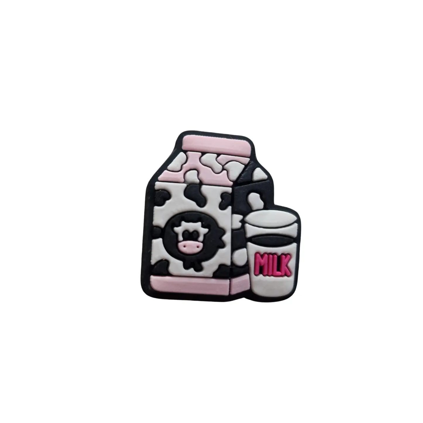 a bottle of milk with a pink and black design