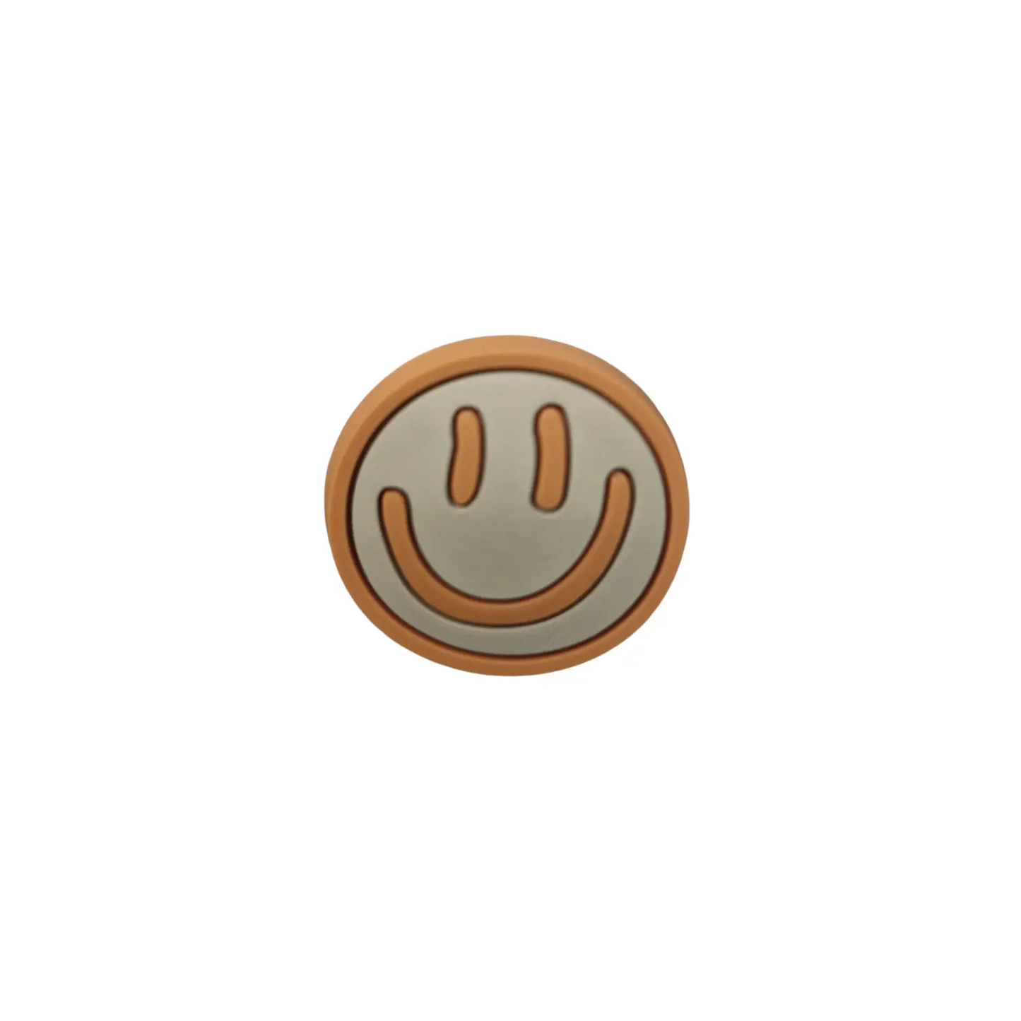 a button with a smiley face on it