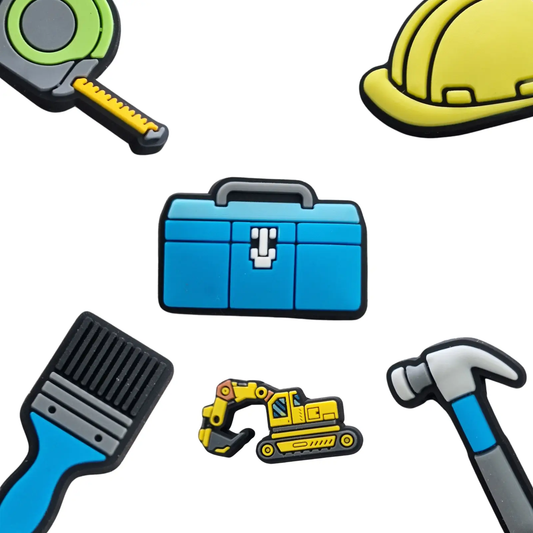 a collection of construction related items including a hard hat, a tool, and a